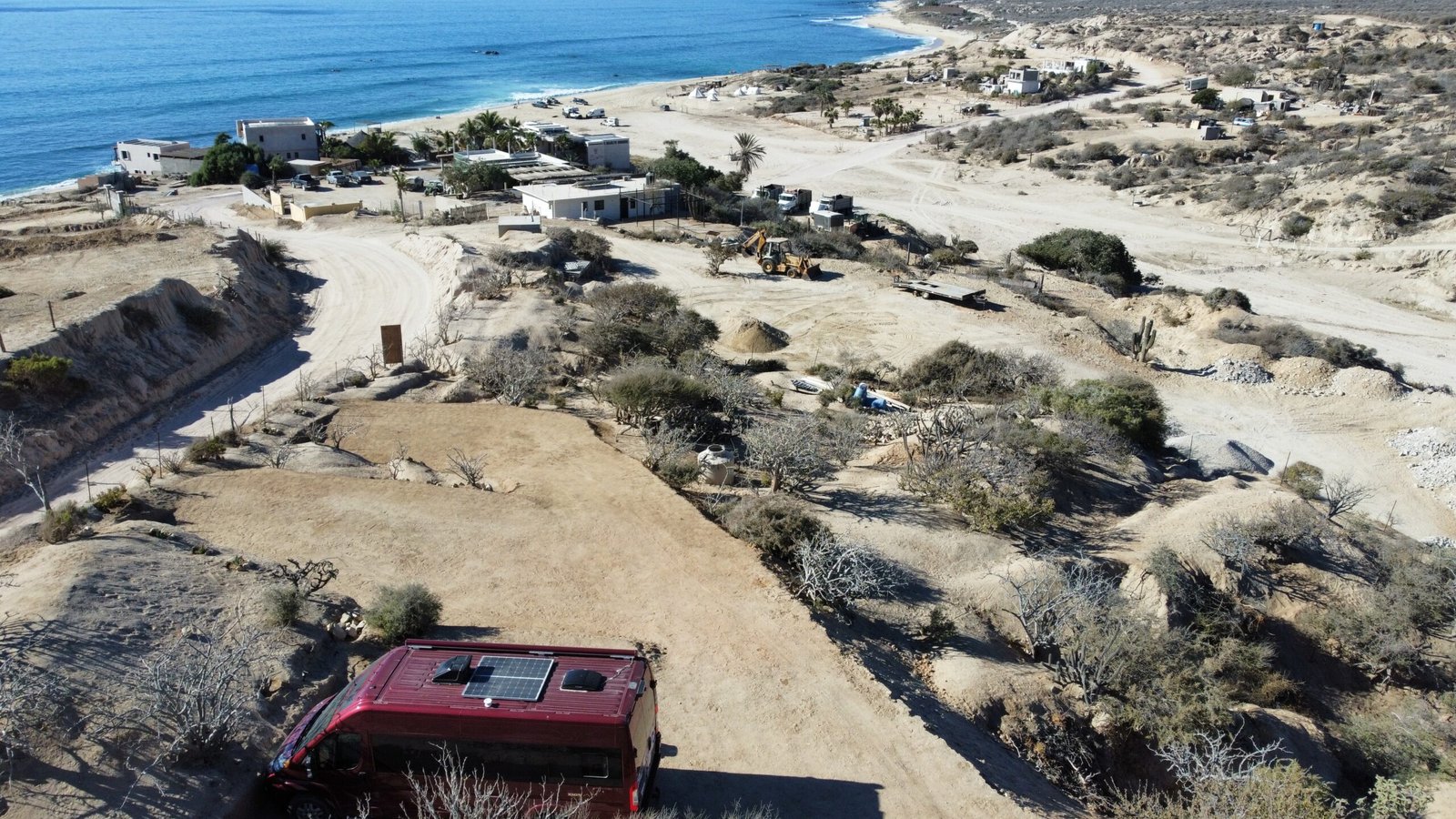 Aerial view of the campsites and the East Cape coast